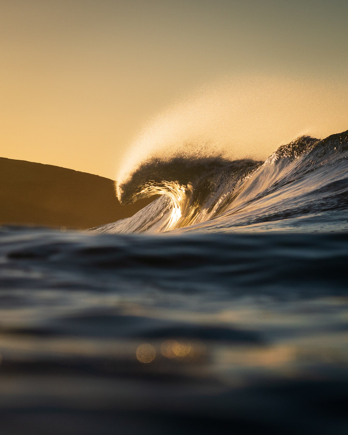 Winter surfing in Porthleven Cornwall by Laurie McCall Art and Photography