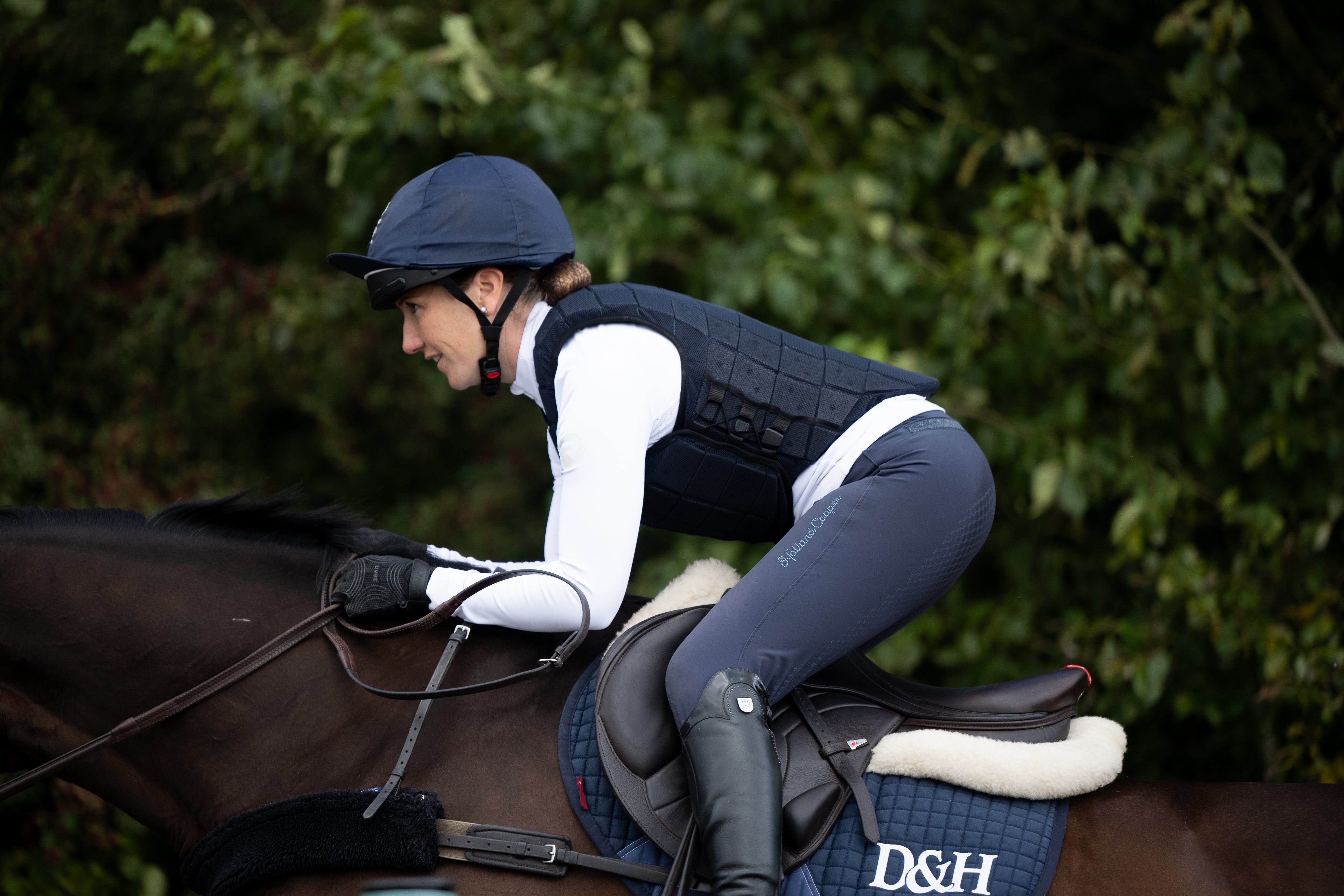 Laura Collett jumping in Motion3 body protector