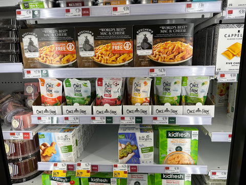 once upon a farm frozen plant-rich meals on a freezer shelf at whole foods