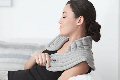 woman wearing a heated neck wrap