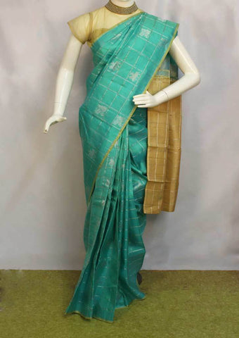 sandal with green silk saree