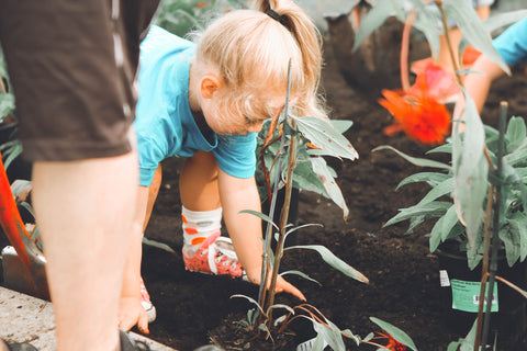 little girl gardening by Anna Earl on Unsplash