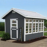 ez fit sheds greenhouse in a yard