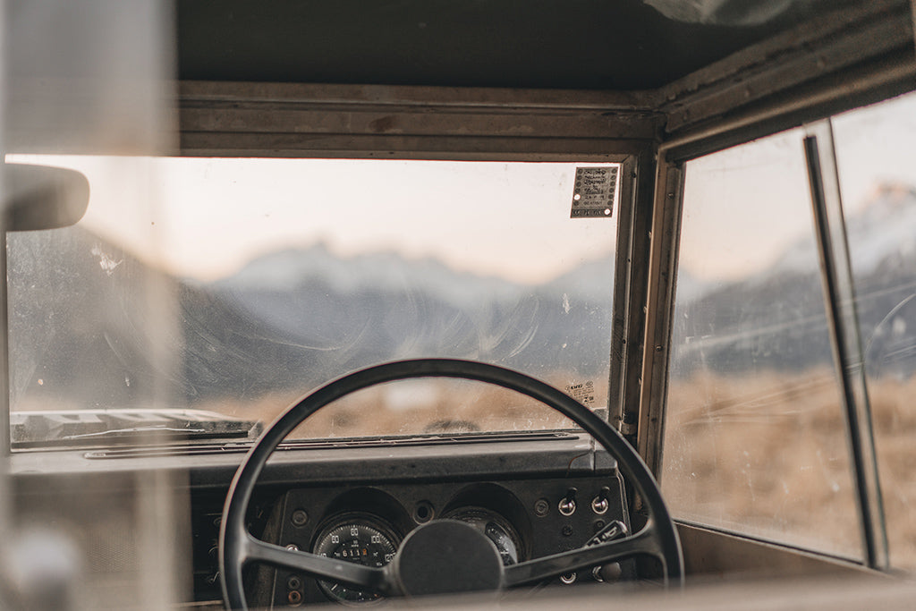 Original dashboard and steering wheel of vintage Land Rover