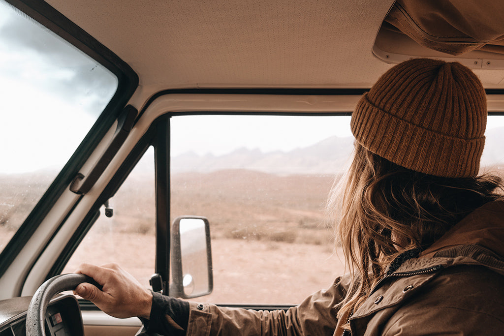 Driver Alexander Knorr takes in the view whilst driving vintage van through South Australian Desert