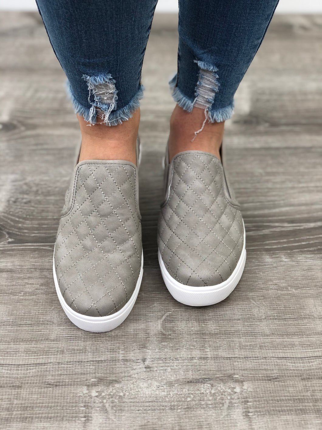 quilted slip on sneakers