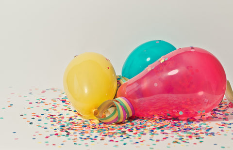 Party decorations like balloons and confetti