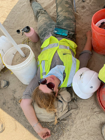 Aubrey at an archeological dig in California. She is rocking her upcycled, rubber, adventure jewelry.