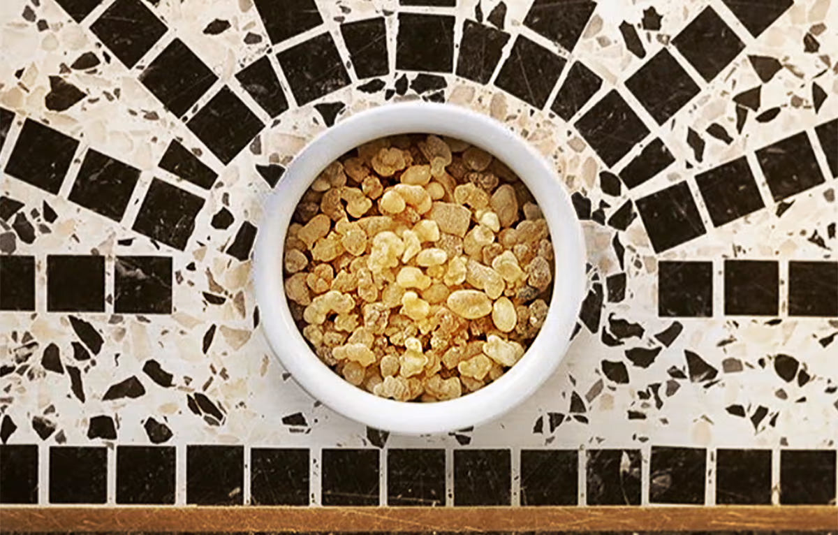 frankincense tears in jar on tile mosaic