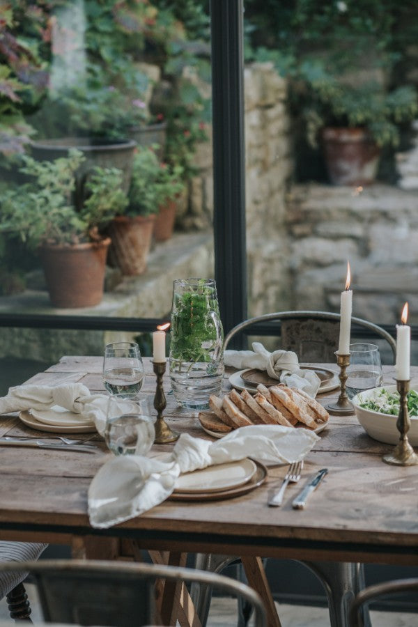 Tie your napkins in a simple knot for a relaxed dinner party