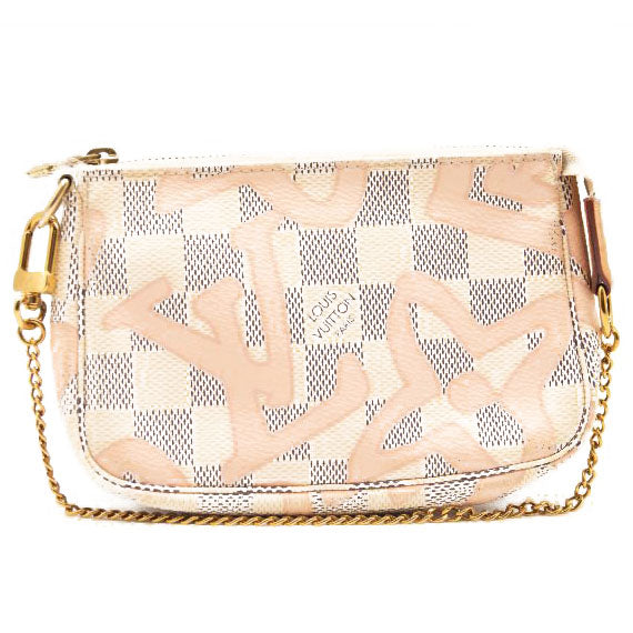 Louis Vuitton Pochette Accessories Giraffe Xmas Monogram Mini Brown/Pink in  Canvas with Gold-tone - US