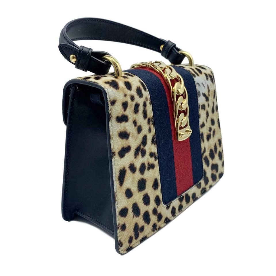 calf hair leopard purse