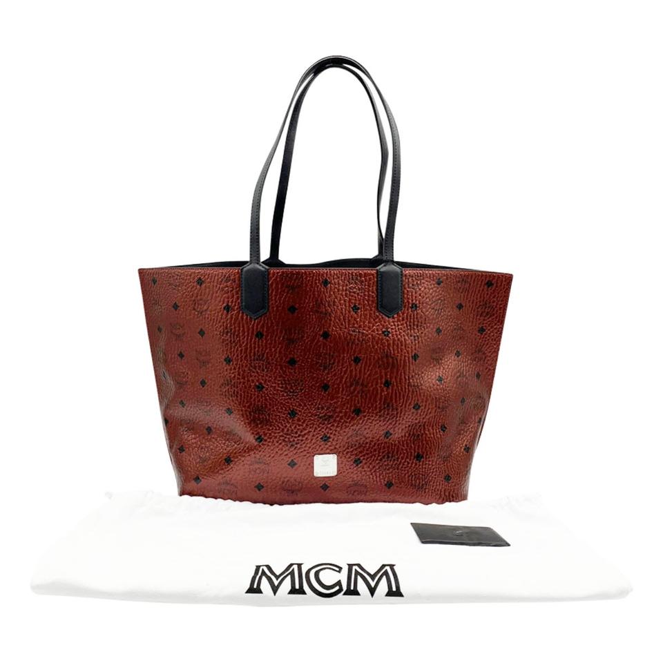 red mcm tote bag