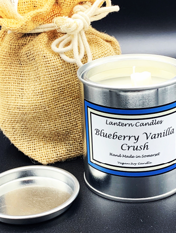 Latern Candles Blueberry Vanilla Crush scented candle in a lever lid tin.