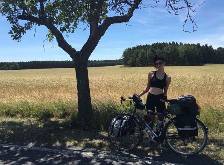 Ben Flanagan: his girlfriend martha and her bike in the shadow of a tree