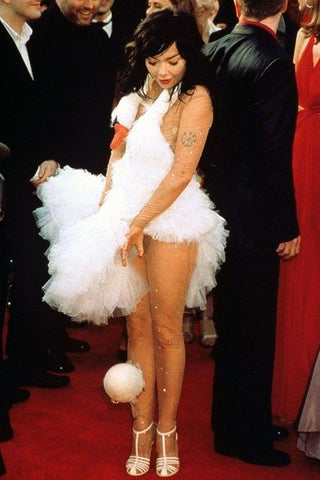 Bjork in the swan dress laying an egg