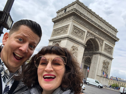 Posing in front of the Arc de Triomphe