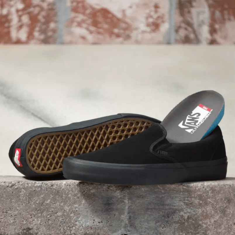 vans pro blackout slip on