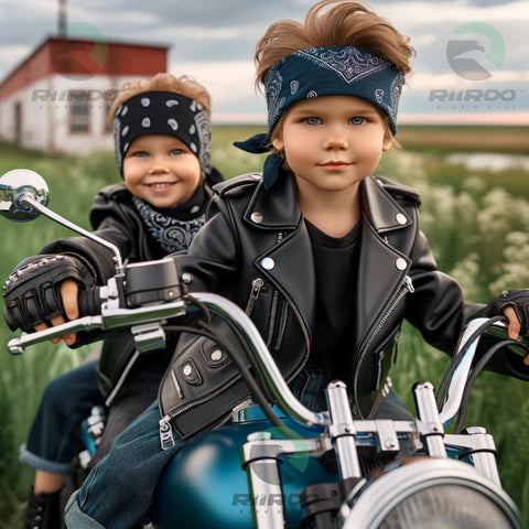 Two young children are staged in a scene where they pretend to ride a motorcycle