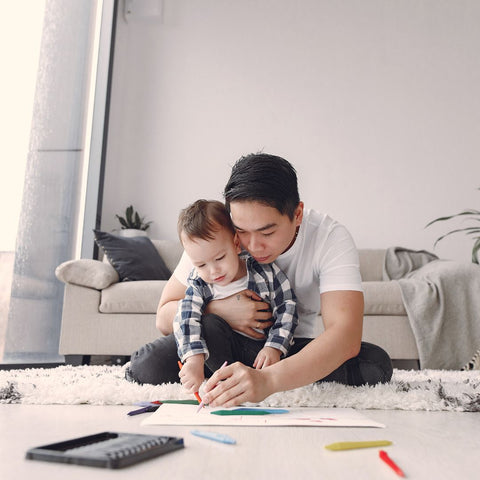 father playing with child