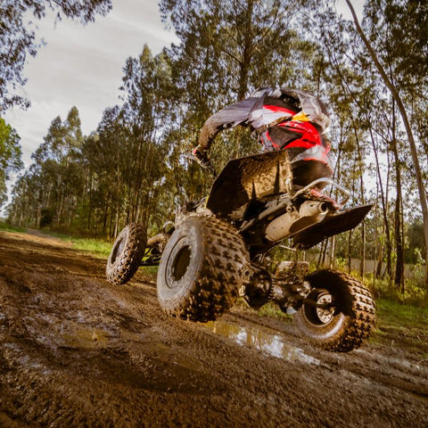 quad biking on mud