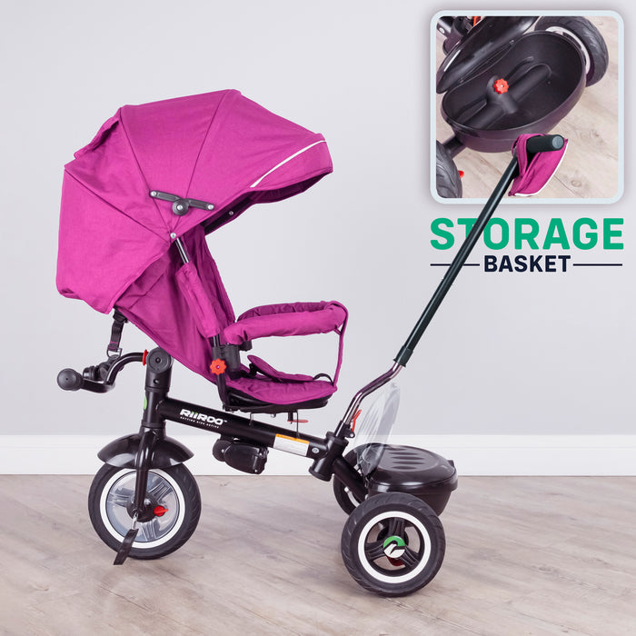 pink trike with parent handle