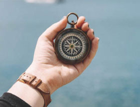 person holding a watch