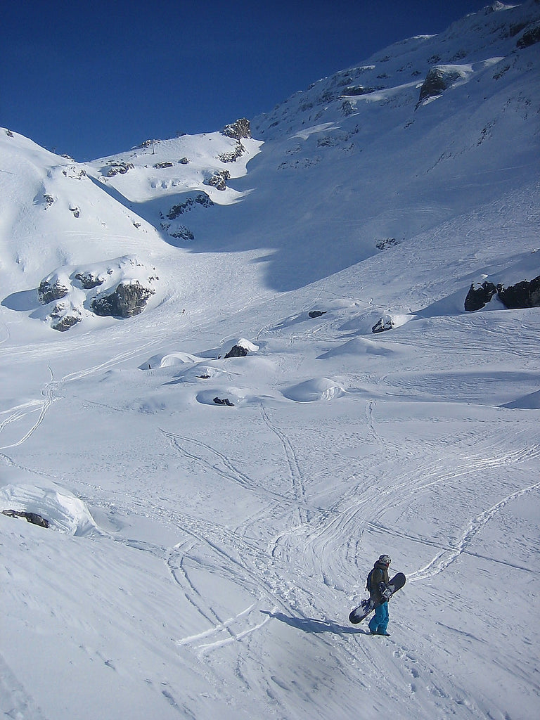 Photo & Art Print Freeride skiier riding in deep powder snow