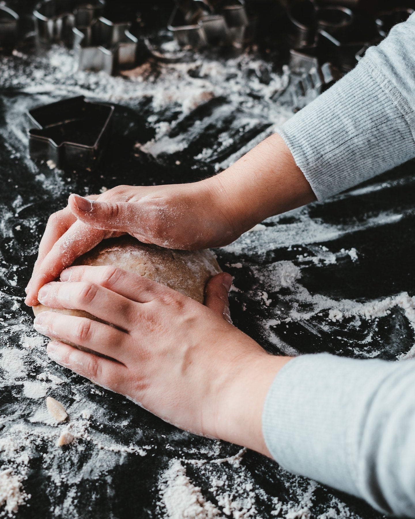Person Shaping Dough