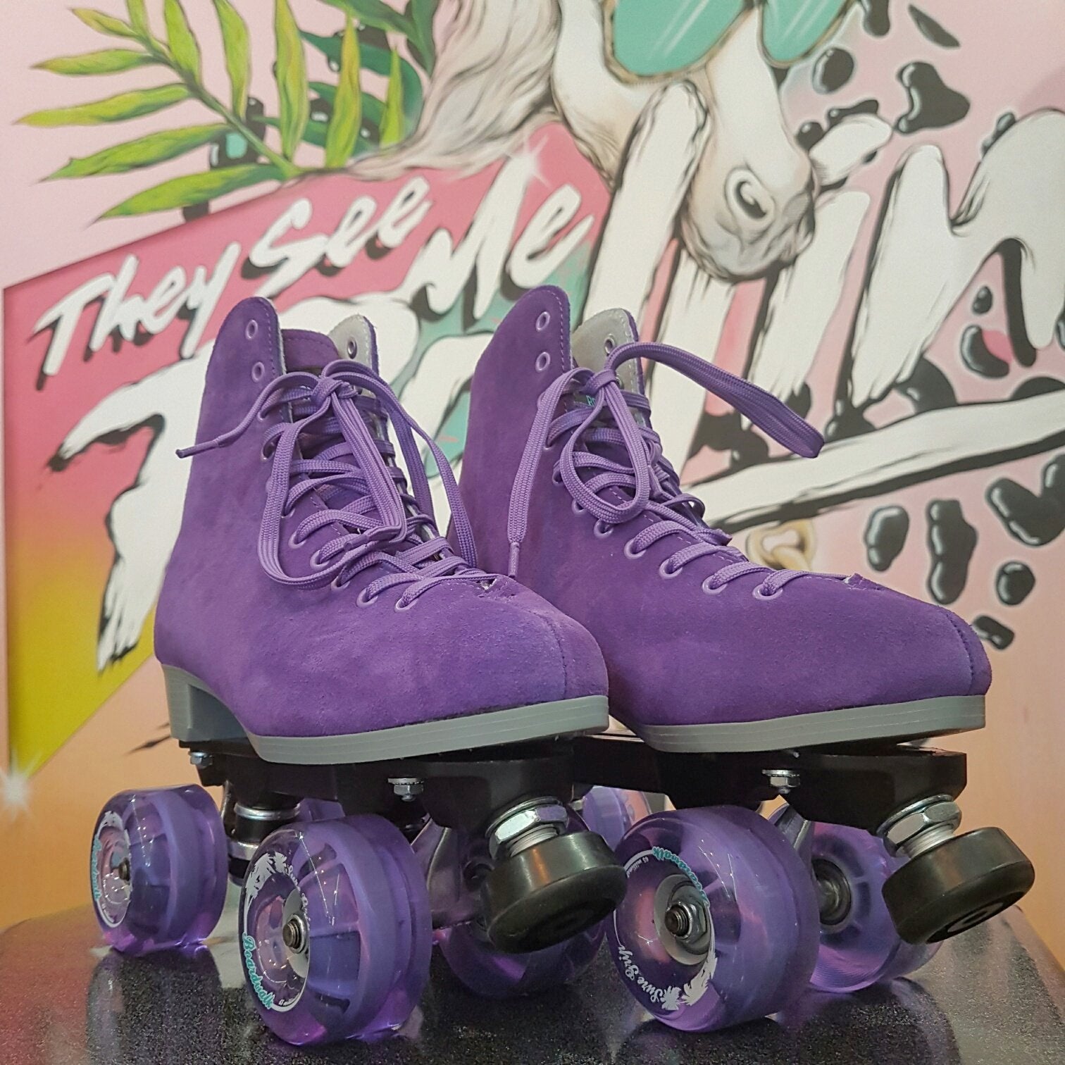 purple suede roller skates