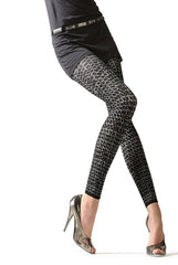 Lady's legs in black pattern footless tights and gold shoes.