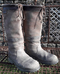 orca bay country boots with mud