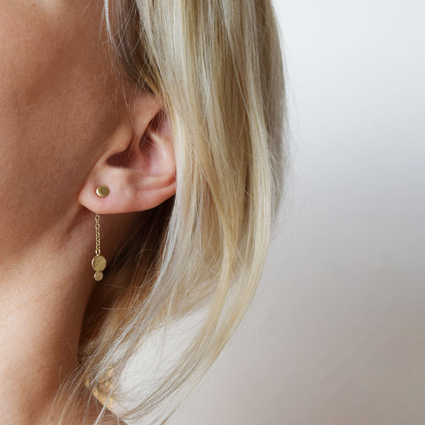 gold ella earrings worn by blonde model