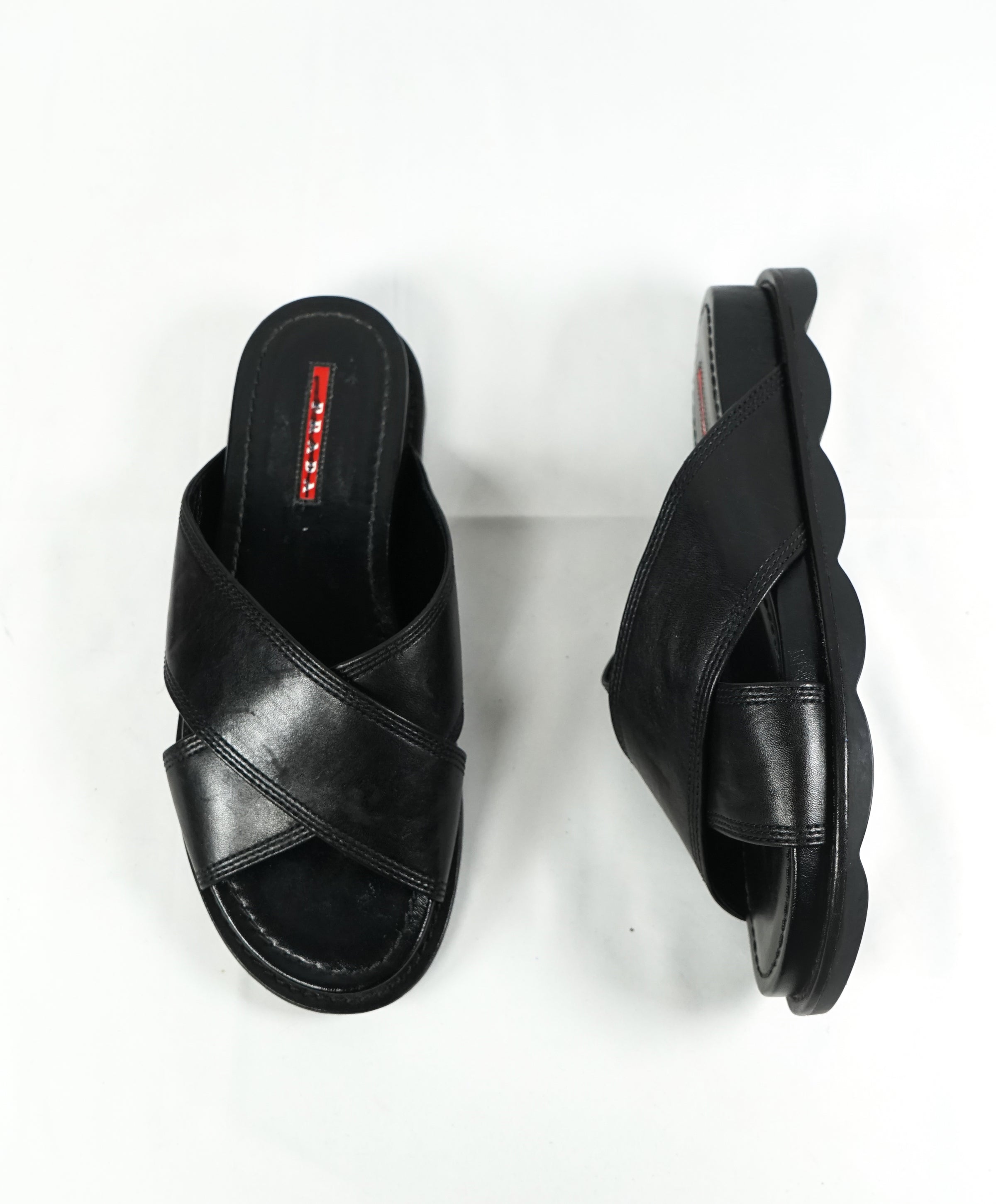 PRADA - Linea Rossa Black Crisscross Raised Leather Slide Sandals - 8. –  Luxe Hanger