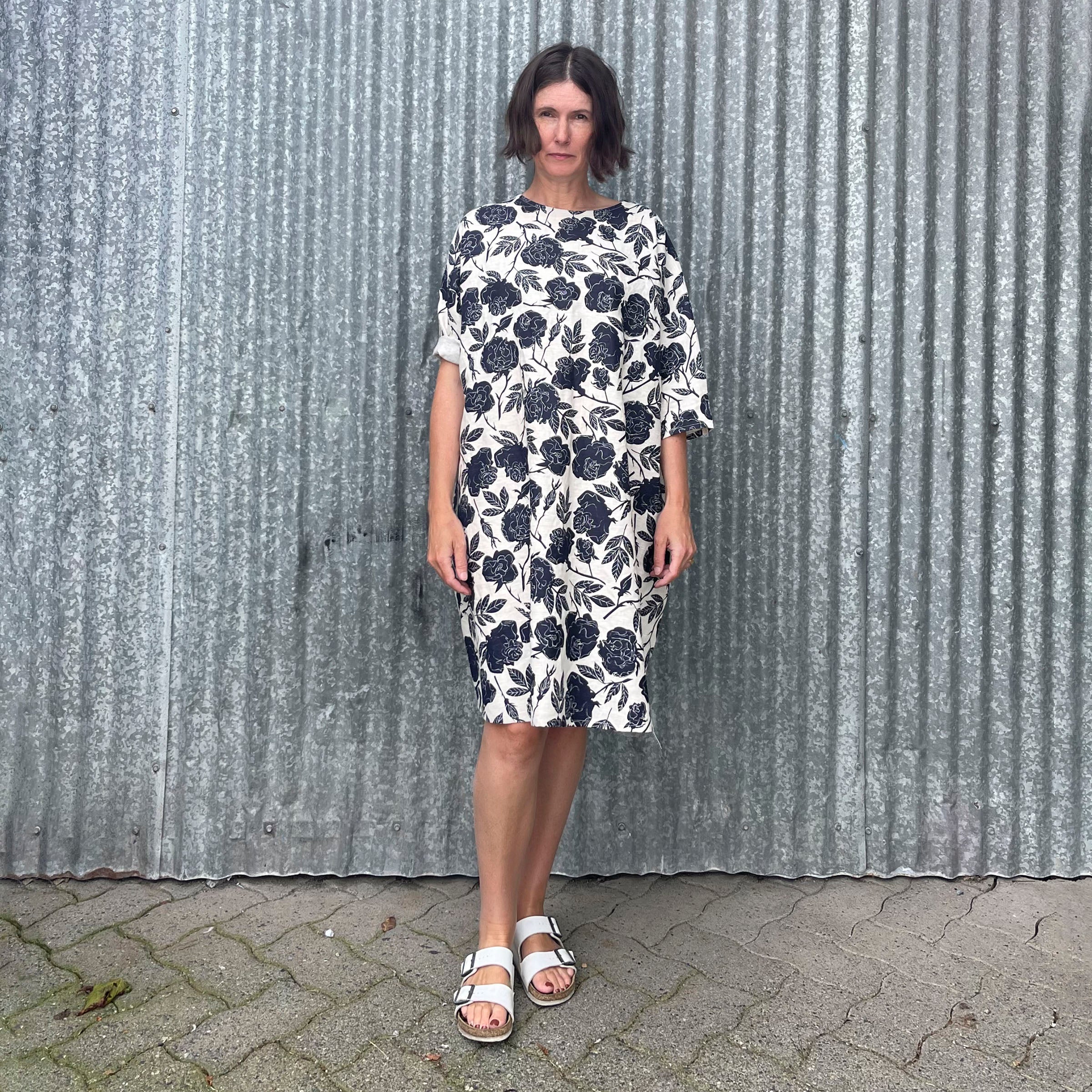 all over rose print in dark navy on a simple linen dress