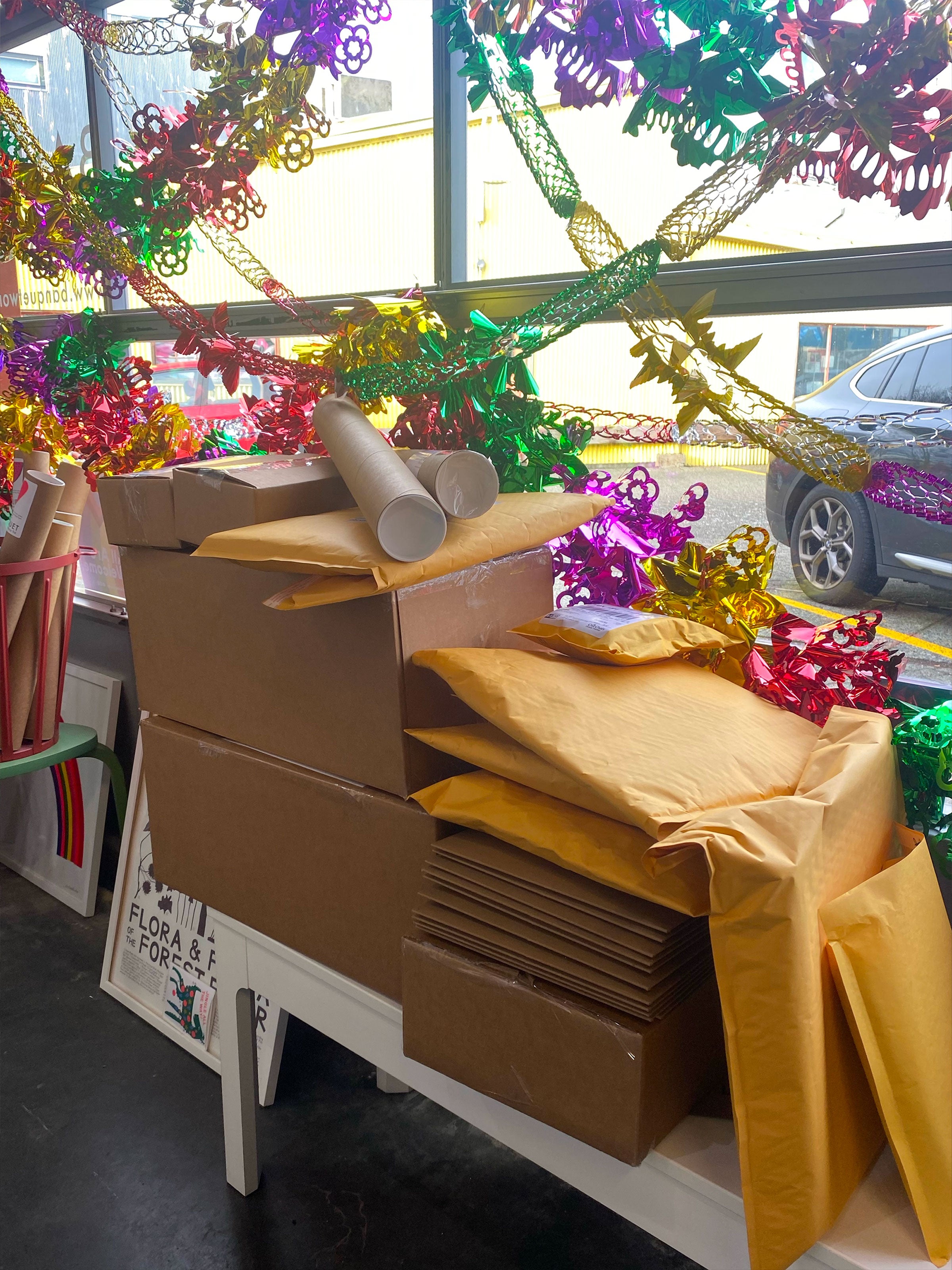 pile of packages ready to go to the post office