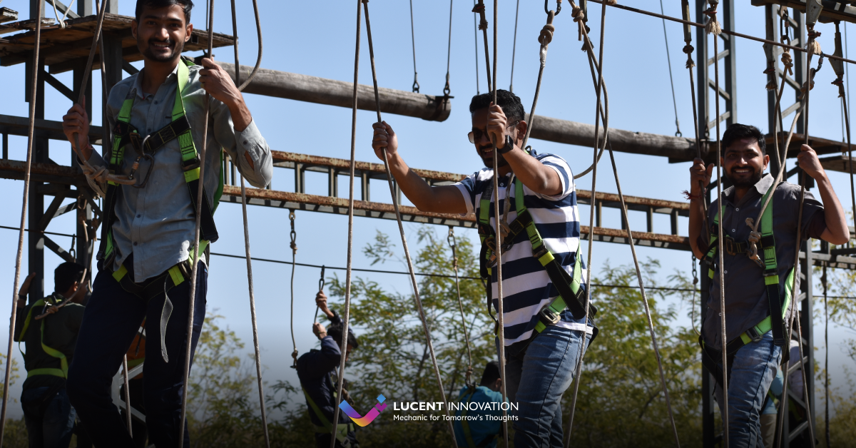 Lucent team walking on burma bridge