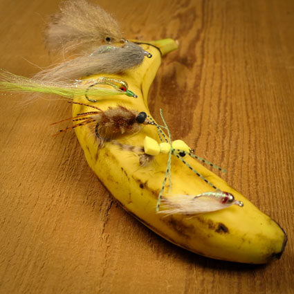 Flies stuck in a banana.