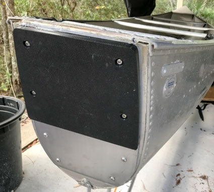Canoe transom repaired with aluminum sheets and Starboard.