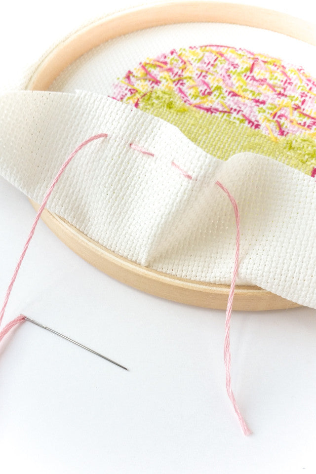 How to frame cross stitch and hand embroidery in an embroidery hoop -  Stitched Modern