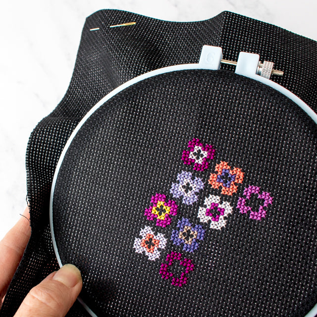 8 tips for cross stitching on black (or dark) fabric - Stitched Modern