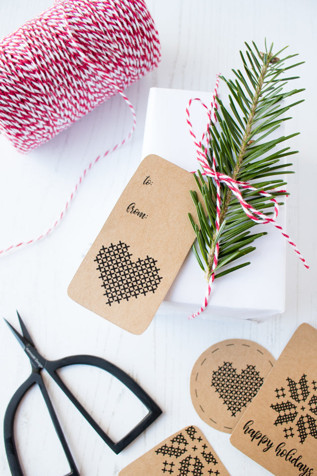 Free printable cross-stitch inspired holiday gift tags