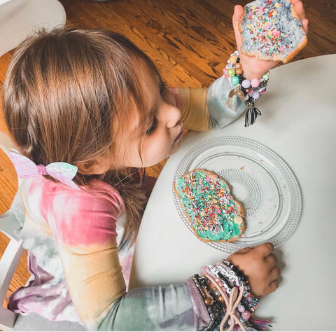 girl-in-rainbow-dress-eating-colorful-sprinkle-toast-vegan-babies-of-instagram