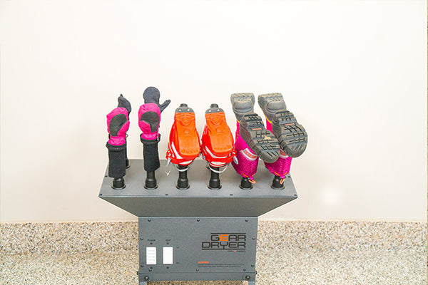 Freestanding GearDryer with kids snow boots and gloves