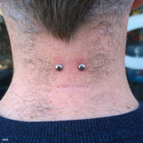Nape surface piercing by Zach