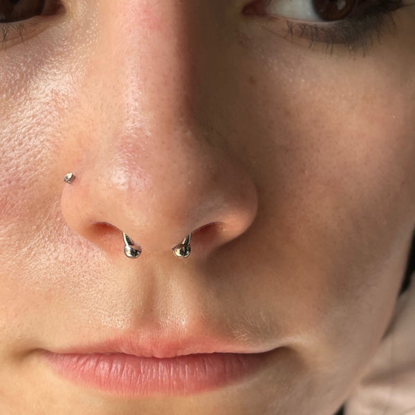 Infinite Body Piercing septum and nostril piercing