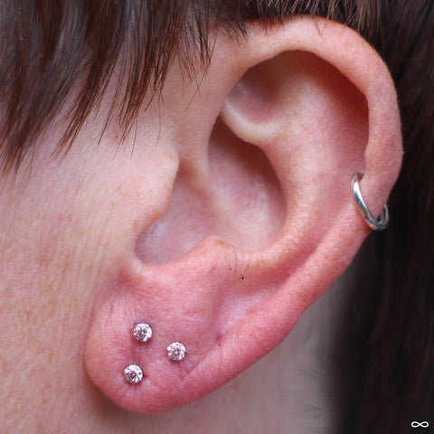 Stacked Earlobe Piercings by John