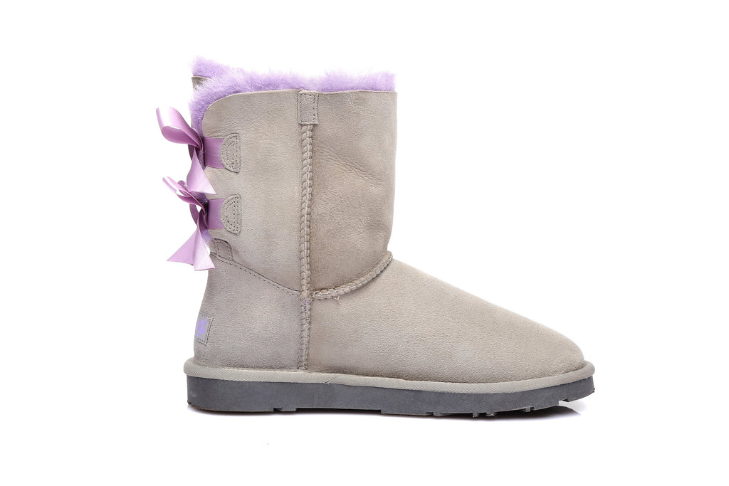 purple uggs with bows on the back