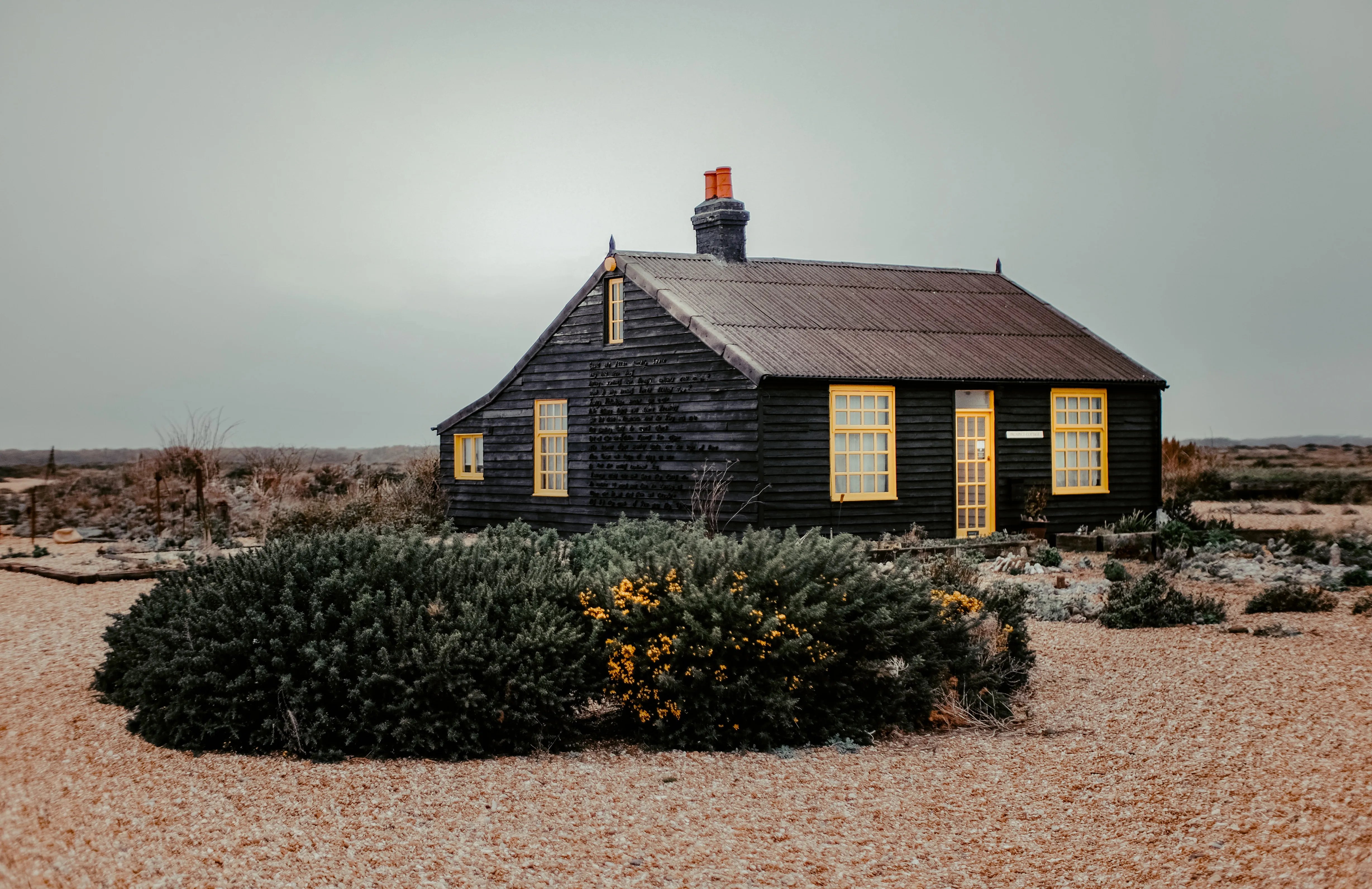 Prospect Place. Derek Jarman's home. one-story building made of corrugated metal and timber.