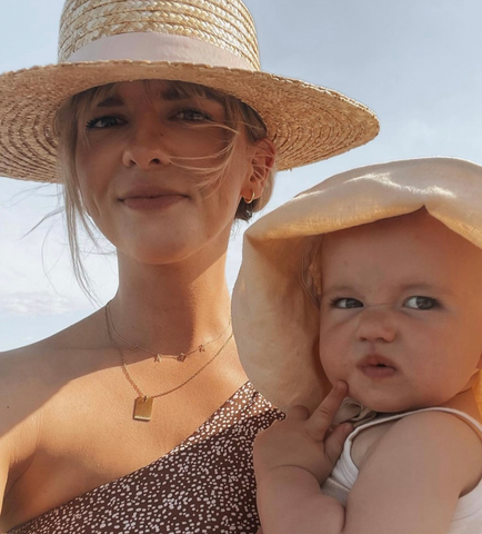 tini lux jewelry mother's day gift guide, mother and daughter on the beach wearing tini lux jewelry